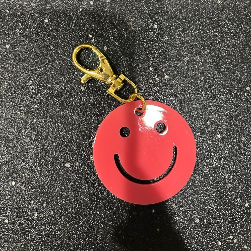 Pink smiley 😃 keychain